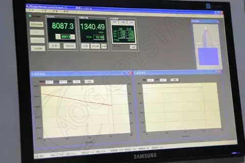 real-time-microcomputer-single-crystal-pulling-growth-control-system